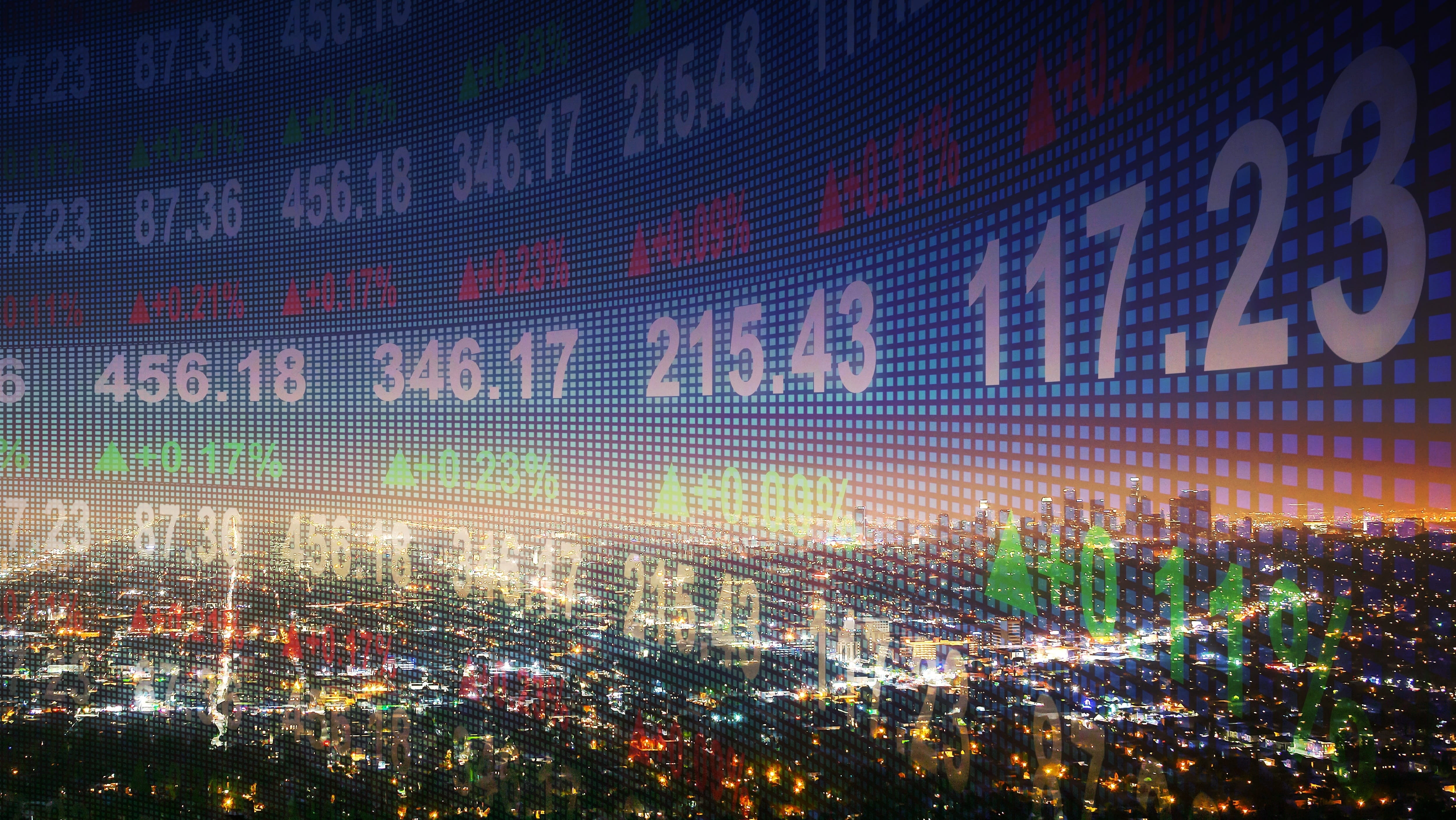 numbers and words on a screen overlayed on top of a city