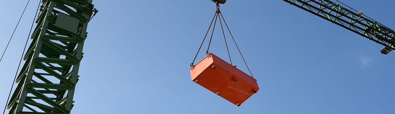 a crane lifting supply box