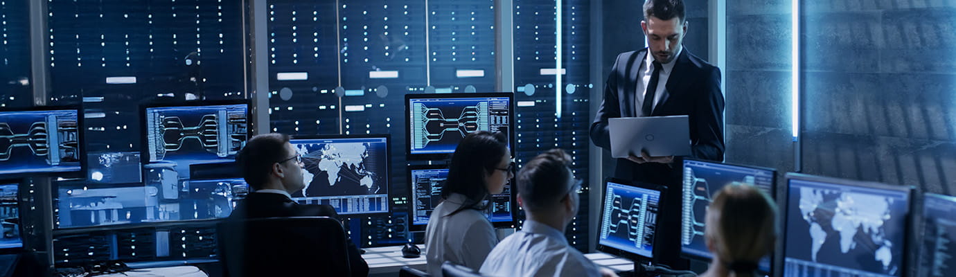 a team of data scientists looking at data