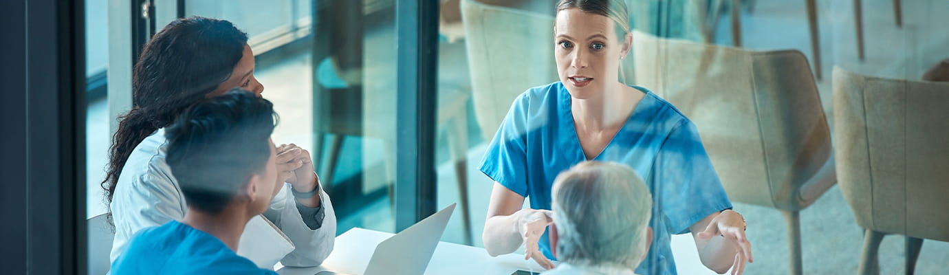 healthcare workers at a table
