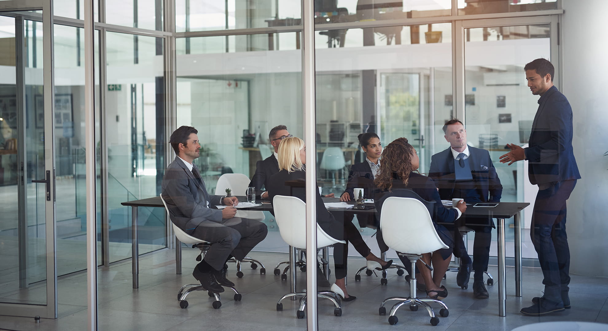 Colleagues in accounting department illustrating tax accounting methods