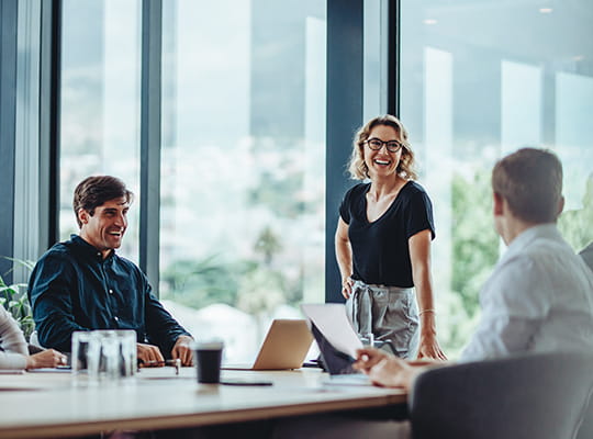 a team talking at a table