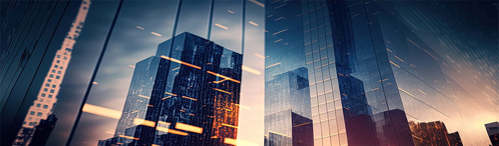 glass windows on high rise buildings with a sunset shadow