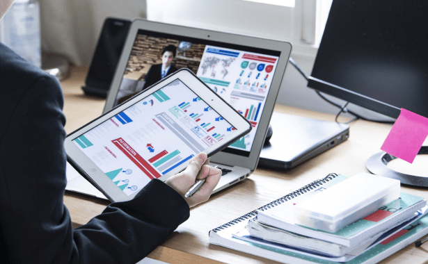a woman on a call holding a tablet