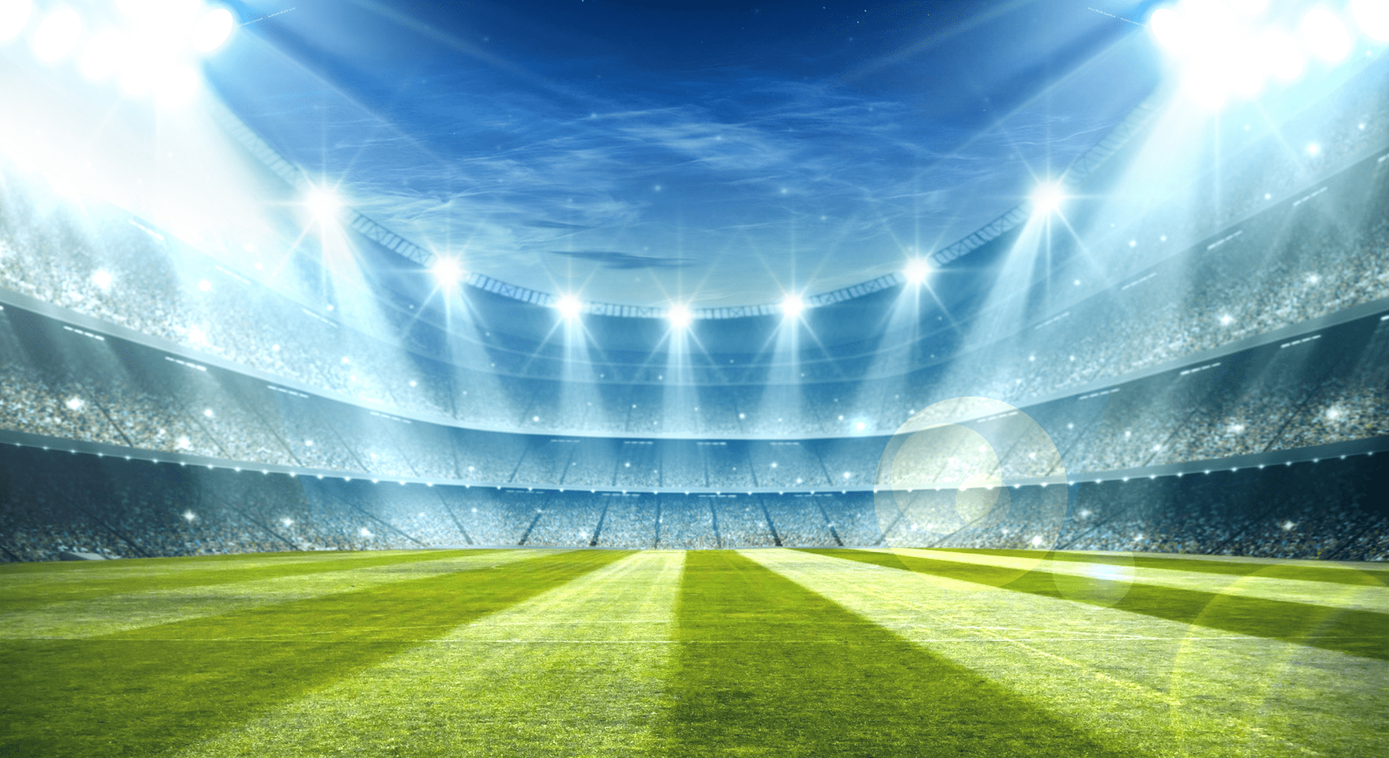 a lit up stadium at night