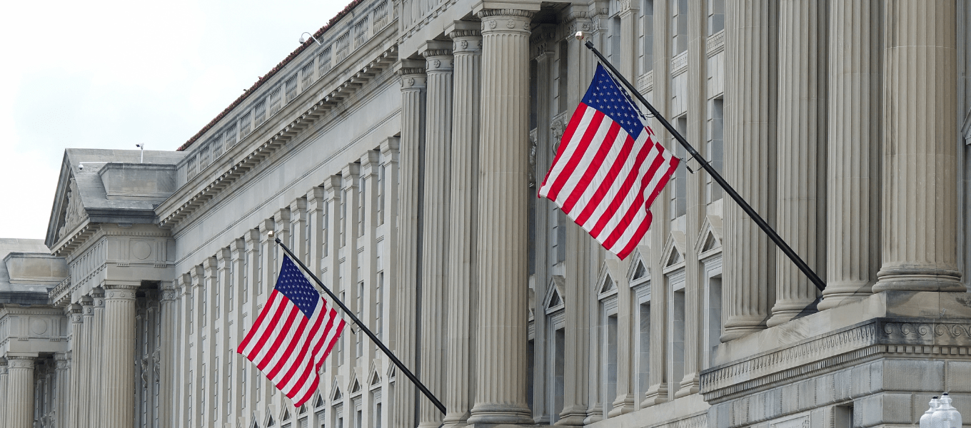american flags on a government building