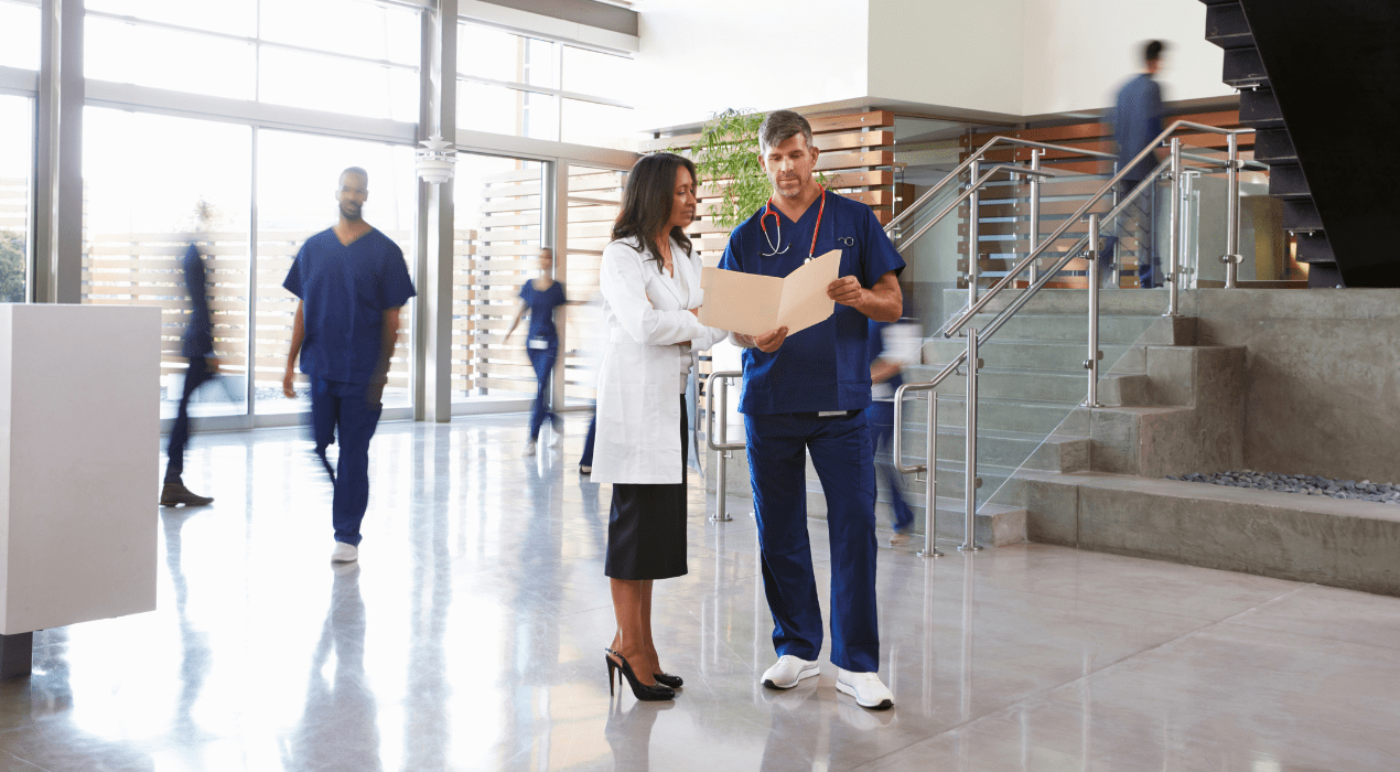 2 colleagues in a healthcare setting